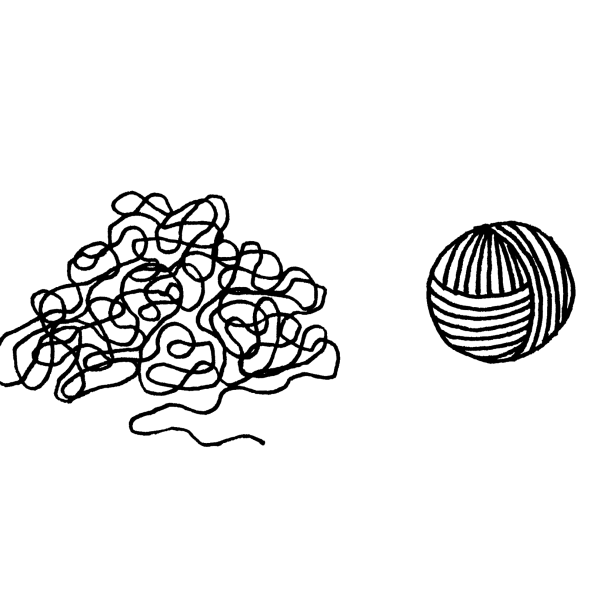 Tangled yarn on the left of a ball of yarn
